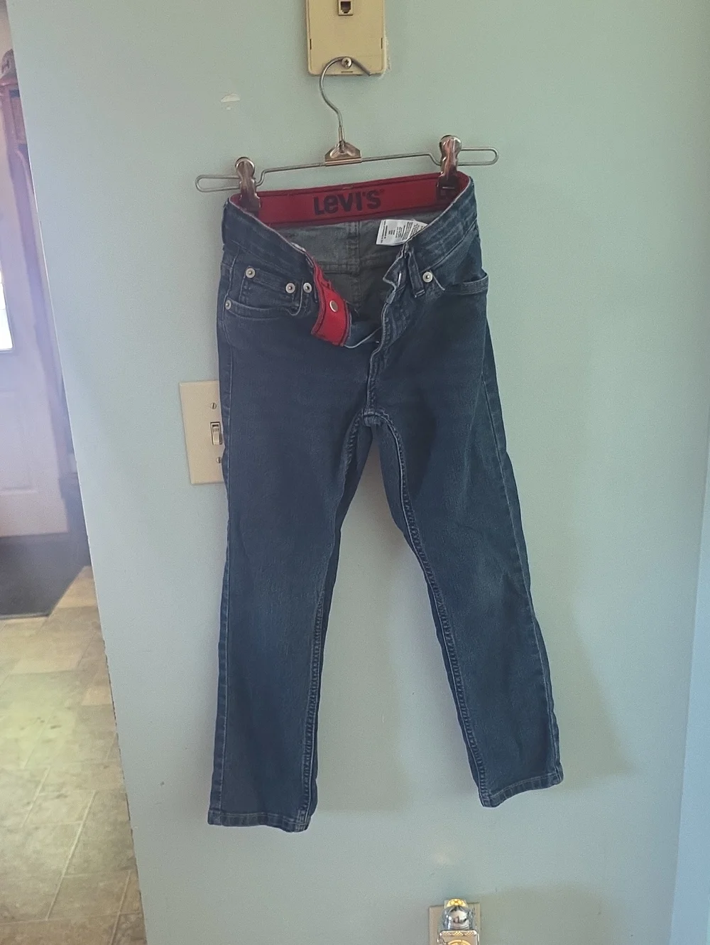 Levi's Blue Denim Straight Jeans with Red Waistband Accent